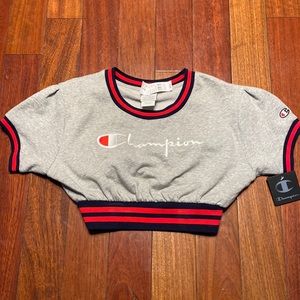Champion crop short sleeve sweat shirt. Brand new w tags. Size small